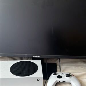 White and Black Console with Compact Design and Controller
